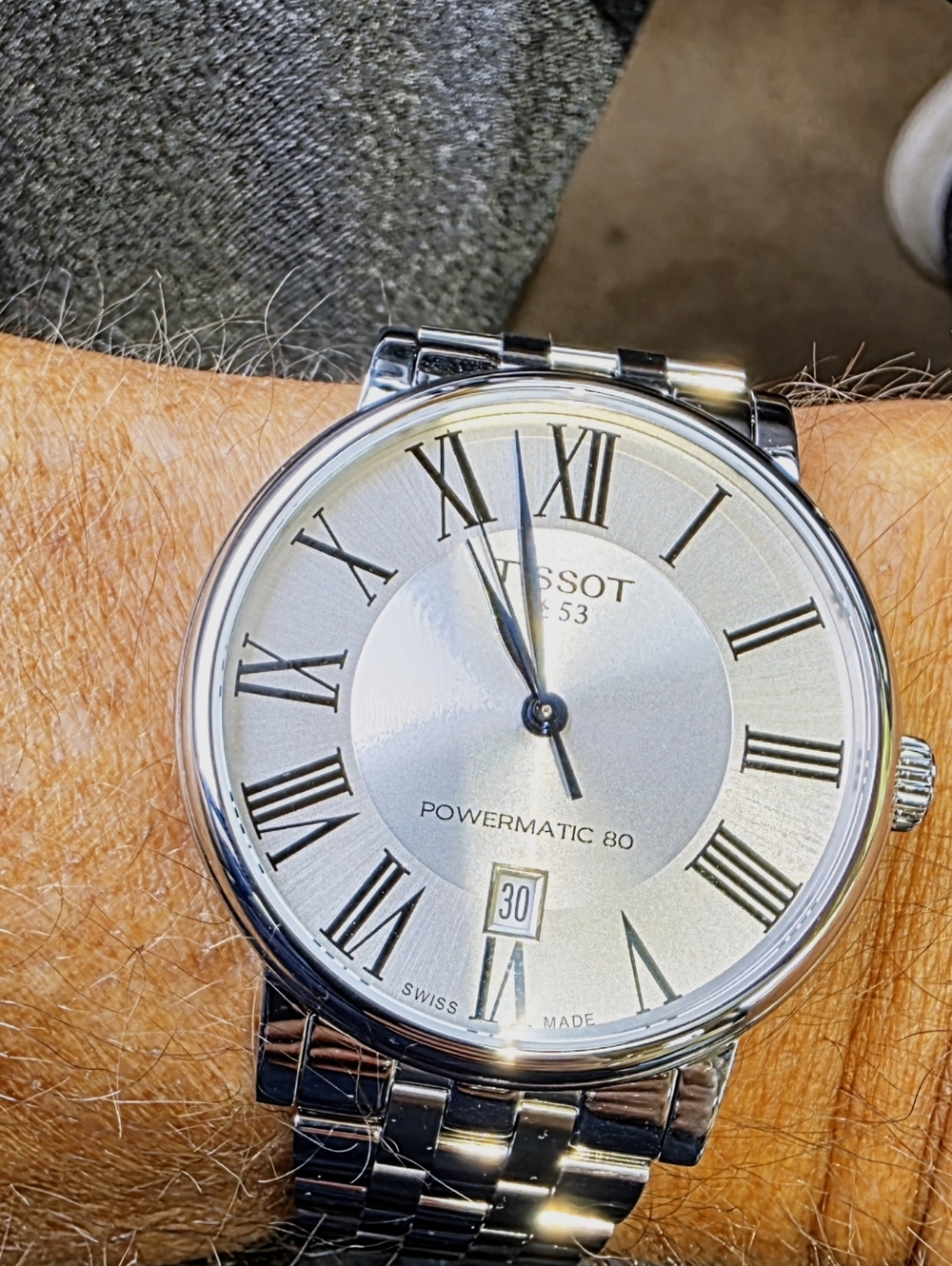 Tissot Silver Watch with Blue Hands and White Dial